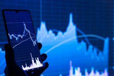 Stock Market Today: Mixed Trading as Wall Street Digests Tech Earnings and Trade Deal Hopes cover