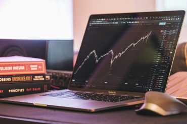 Stock Market Today: Stocks Surge as S&P 500 and Nasdaq Hit Record Highs on Earnings and Trade Optimism cover