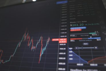 Stock Market Today: Stocks React to Earnings Reports and Trade Developments as Markets Eye Fed Meeting cover