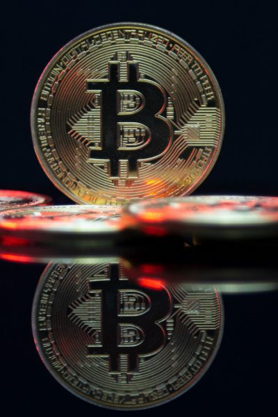 a bit coin sitting on top of a table