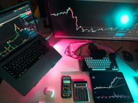 A laptop computer sitting on top of a desk