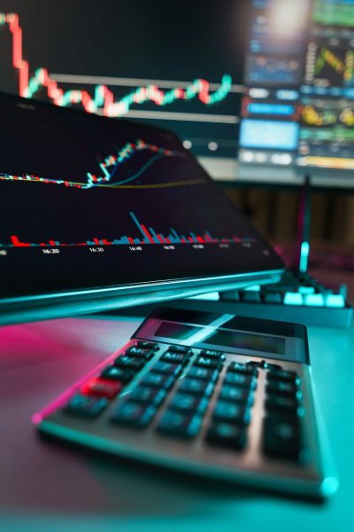 A desk with a keyboard and a monitor