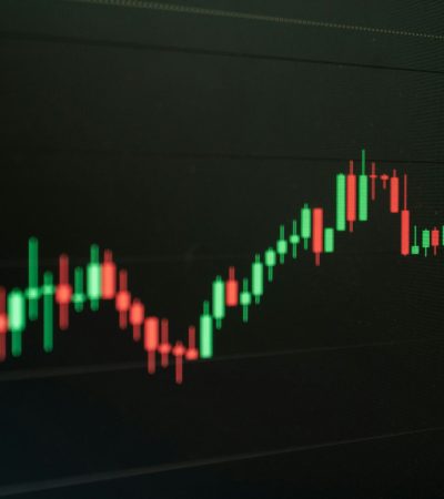 Stock chart indicates growth and potential profit.