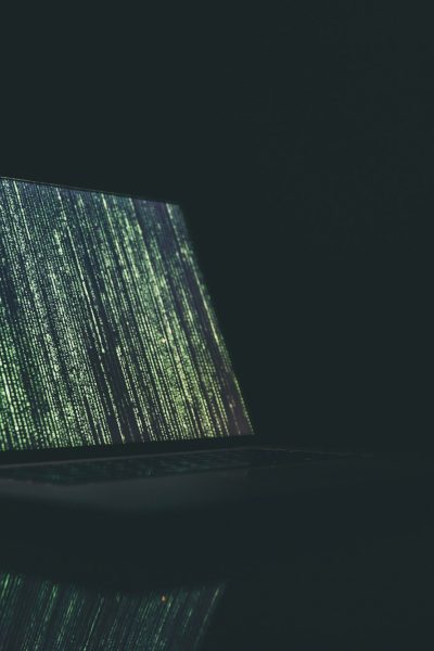 black and gray laptop computer turned on
