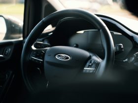 black nissan car steering wheel