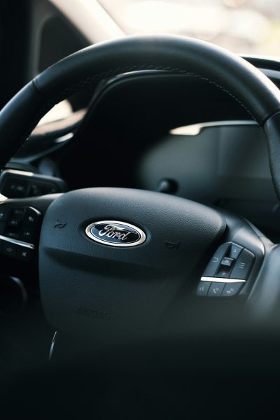 black nissan car steering wheel