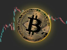 a bitcoin is shown in front of a stock chart