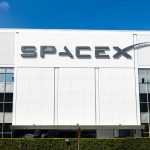 a building with a sign that says spacex on it