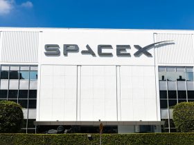 a building with a sign that says spacex on it