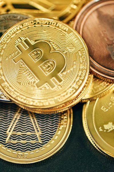 a pile of gold and silver bitcoins